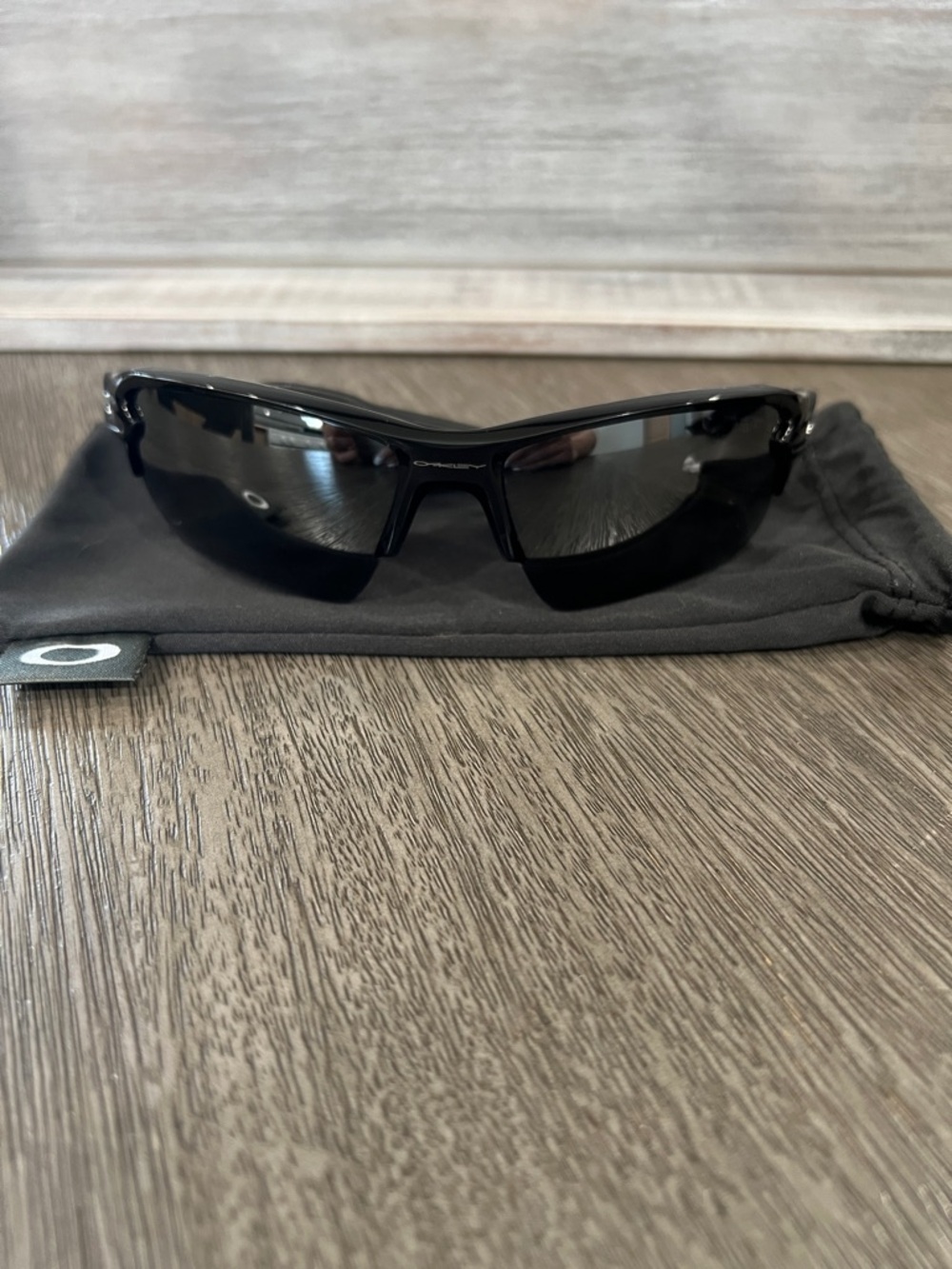 Oakley Glossy Black Sport Sunglasses with Dark Lenses